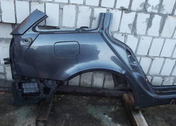 Renault Laguna 2 błotnik tył kombi