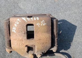 Nissan Primera P12 zacisk hamulcowy jarzmo prawy przód