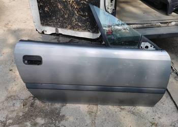 drzwi przód prawe opel Calibra 1995r zamek klamka szyba