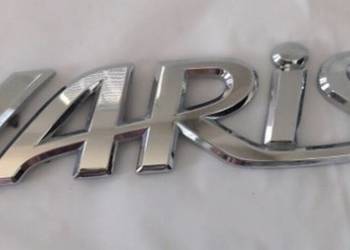 NOWE logo klejane emblemat Yaris znaczek chrom srebrny przyk NOWE logo klejane emblemat Yaris znaczek chrom srebrny przyk