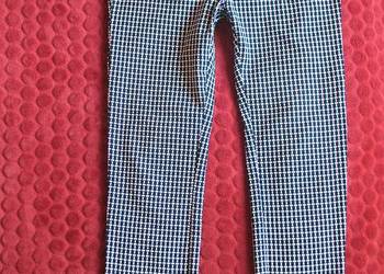 Spodnie - damskie - biało  czarne - 42 XL - biodra 100 cm UPFashion