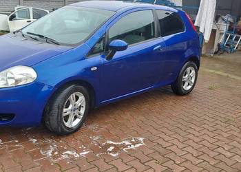 Błotnik lewy prawy Fiat Grande Punto kolor 599A