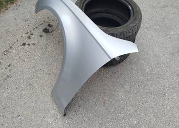 Błotnik przedni audi A4 po liftingu lewy i prawy w kolor LX7W