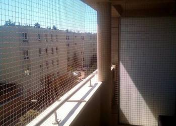 Siatka ochronna na balkon dla kota bez wiercenia Warszawa Montaż Siatki Kot