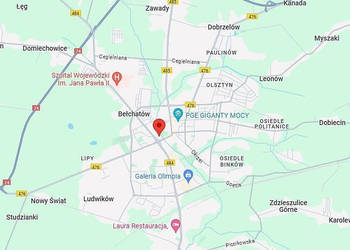 Działka zabudowana budynkiem handlowo - usługowym