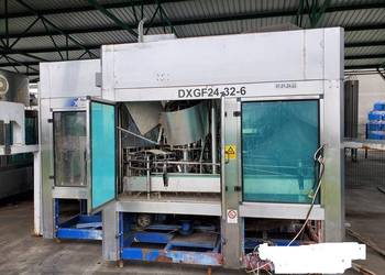 W cal. lub czesci Monoblok Nalewarka PET 12000 bph 0,33 L 24/32/6 2005