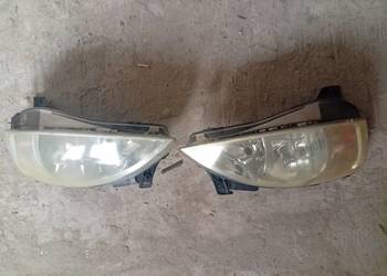 Reflektor prawy lewy Opel Corsa c lift