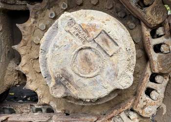 Zwolnica koparki New Holland e215 (O&K)