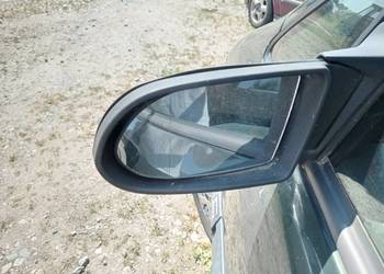 Lusterko lewe elektryczne Opel Zafira 2,0 DTI 2003 r. kod lakieru Z 380