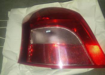 Oryginalna lampa Toyota Yaris II LUNA, 2008 rok, tył lewy przed liftem.