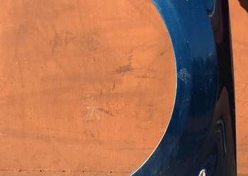 BŁOTNIK LEWY PRZÓD FORD MONDEO IV MK4 kolor nie znany części Czarna Opona