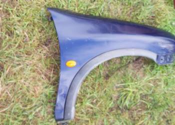 Blotnik przód prawy OPEL CORSA B  granatowy Blotnik przód prawy OPEL CORSA B  granatowy