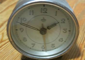 Budzik mechaniczny Thiel, metalowy, 7,5 cm średnicy, używany