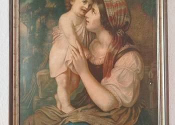 Kobieta z dzieckiem na ręku