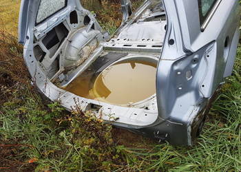 OPEL ASTRA H KOMBI BLOTNIK TYLNY LEWY CWIARTKA PAS TYLNY