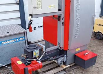 Piec z podajnikiem Hargassner 55 KW zrębka trociny pellet biomasa Heizomat