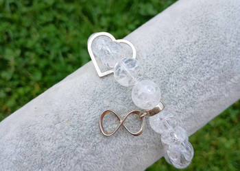 Bransoletka z Kryształu lodowego 10mm z sercem i symbolem nieskończoności Bransoletka z Kryształu lodowego 10mm z sercem i symbolem nieskończoności