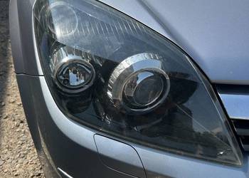lampy przednie kompletne bixenon ksenony Opel Astra H III