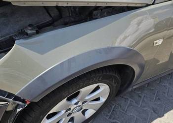 BŁOTNIK LEWY PRZÓD INSIGNIA A COUNTRY TOURER Z30W