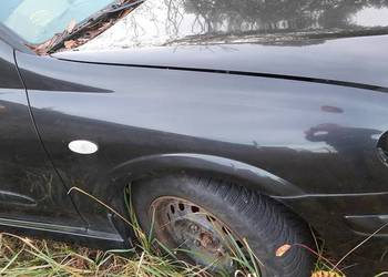 Błotnik prawy nissan Almera n16 kolor Z11
