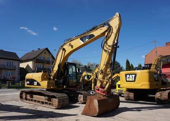 Koparka gąsienicowa CAT 319 D, 2011 rok.