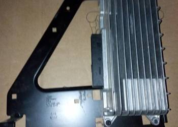 Wzmacniacz ze stelażem z Audi A6 C6 4F0910223K