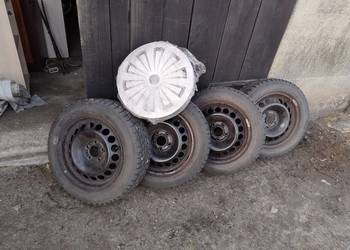 Felgi stalowe z oponami do Audi + kołpaki