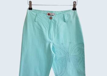 Damskie eleganckie turkusowe spodnie dzwony z motylem Polim 36/S