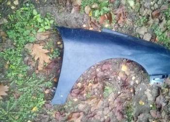 Błotnik przedni prawy RENAULT LAGUNA 1lift granatowy bez kor