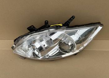 TOYOTA AURIS I LIFT 09-12 81110-02A40 Reflektor Lampa Lewa Przednia