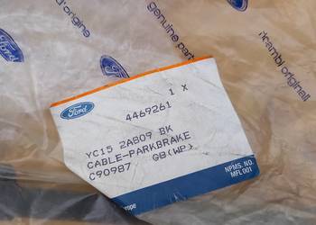 4469261/YC15-2A809-BK Linka ham.ręcznego lewy tył Ford  TRANSIT 2000-2006