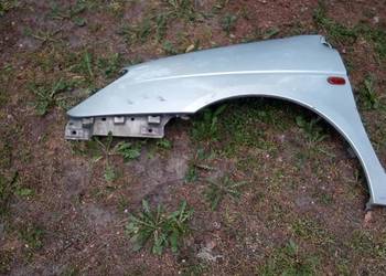 Błotnik przedni lewy RENAULT SCENIC 1 lift srebrny Błotnik przedni lewy RENAULT SCENIC 1 lift srebrny