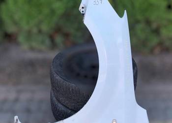 KIA Ceed I Błotnik Lewy przód kolor nie znany Czarna Opona