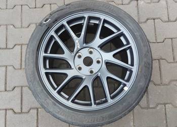 TESLA MODEL Y Koło alufelga 18x8,5J 235/45 R18 Bridgestone 1344221-00-B