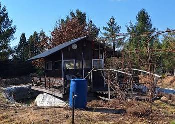 Działka z domkiem i stawem,woda prąd. Starzno