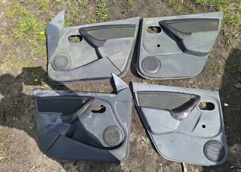 DACIA DUSTER I boczek drzwi 4 sztuki