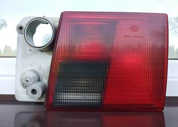 Audi A6 C4 lampa tył tylna prawa w klapę bagażnika Hella 4A0945094