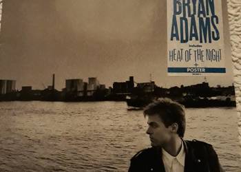 BRYAN ADAMS-Heat od The Night + plakat 60x85 cm.
