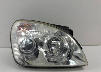 KIA CARENS  III  LAMPA PRZÓD PRAWA SOCZEWKA