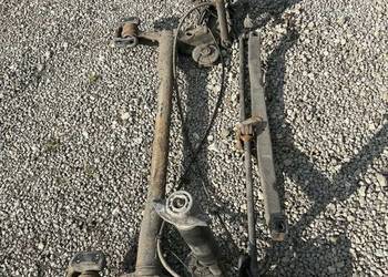 Opel Astra IV HTB Belka oś tył tylna Zaciski