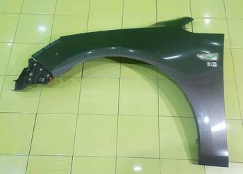 OPEL ASTRA IV J 1.6 B 11r 5D blotnik lewy przod