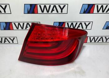 BMW F10 LAMPA PRAWY TYŁ PRAWA W BŁOTNIK ORYGINAŁ USA 7203232