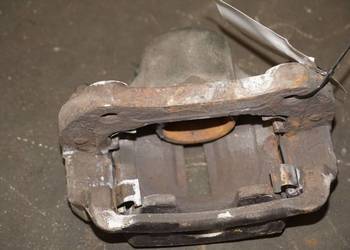 INSIGNIA A ZACISK HAMULCOWY PRZÓD LEWY