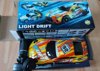 zdalnie sterowany samochód do driftu marki NQD w skali 1:10, model "Light D