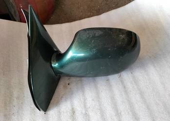 LUSTERKO LEWE Kia Carnival I 1  012107