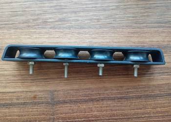 Rolki zwrotne fałów