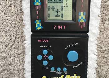 Przenośna konsola do gier Grand Prix Brick Game 7 in 1 MR703 z lat 90-tych