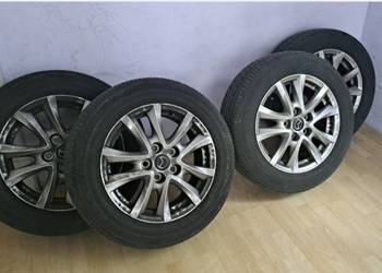 Oryginalne koła Mazda 3. Opony letnie R16 Bridgeston.