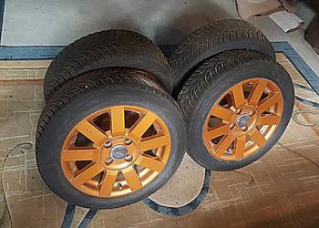 NOWE ALUFELGI Z PRAWIE NOWYMI OPONAMI ZIMOWYMI  DO FORDA