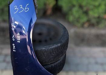 BŁOTNIK PRAWY PRZÓD Peugeot 307 EGED 02-05R Czarna Opona części blotnik